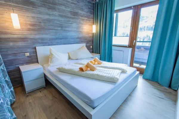 Schlafzimmer 1, Doppelbett  Huberhof 10 by Alpenidyll Apartments