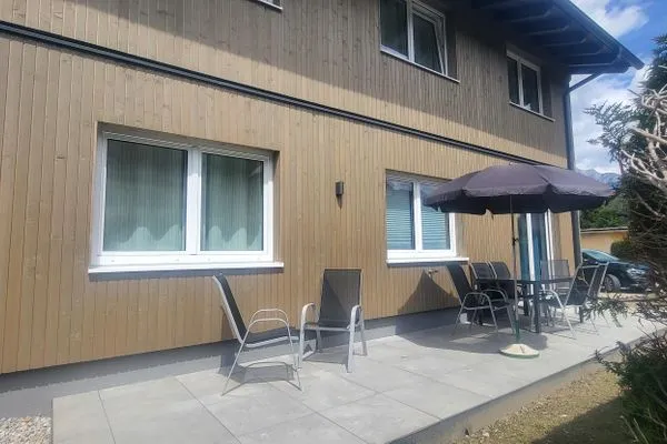 Outdoor area with seating  Lasserhäusl by Alpenidyll Apartments