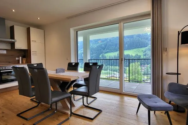 Kitchen with dining area  Fischbacher App. 1 by Alpenidyll Apartments
