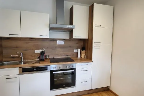 Kitchen  Fischbacher App. 1 by Alpenidyll Apartments