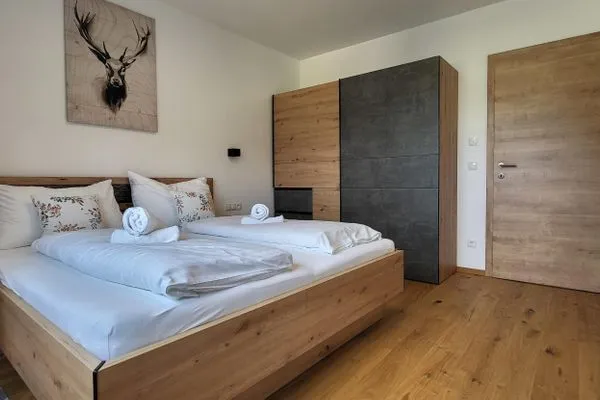 Bedroom 2, double bed  Fischbacher App. 1 by Alpenidyll Apartments