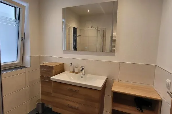 Bathroom with shower  Fischbacher App. 1 by Alpenidyll Apartments