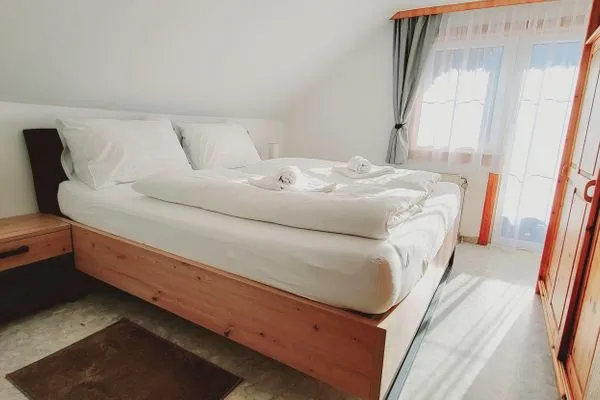 Bedroom 1, double bed  Fischbacher App. 3 by Alpenidyll Apartments