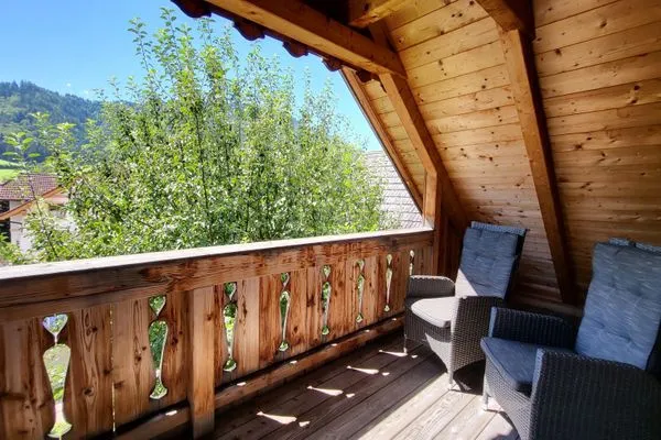 Balcony with a view of the mountains  Stodertraum 3 "Löwenzahn" by Alpenidyll Apartments