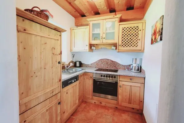 kitchen  Stodertraum 4 "Margerite" by Alpenidyll Apartments