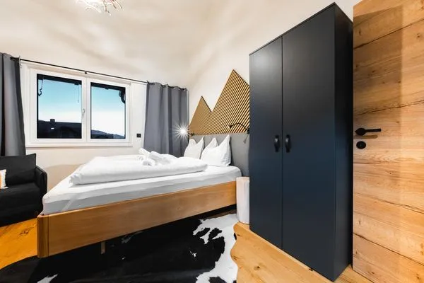 Schlafzimmer 1, Doppelbett  Aich Amade by Alpenidyll Apartments