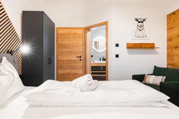Schlafzimmer 1, Doppelbett  Aich Amade by Alpenidyll Apartments