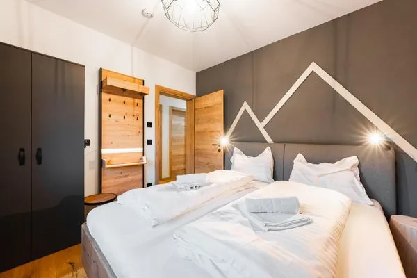 Schlafzimmer 2, Doppelbett  Aich Amade by Alpenidyll Apartments