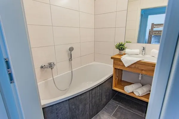 Badezimmer 2, Badewanne  Happy Aich 4 by Alpenidyll Apartments