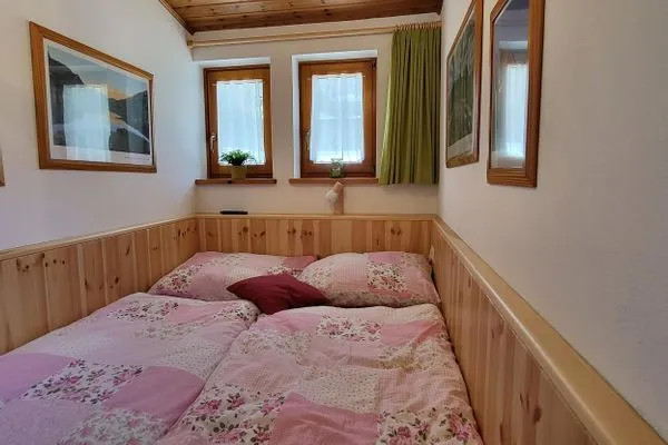kleines Doppelbett  Planaiblick by Alpenidyll Apartments