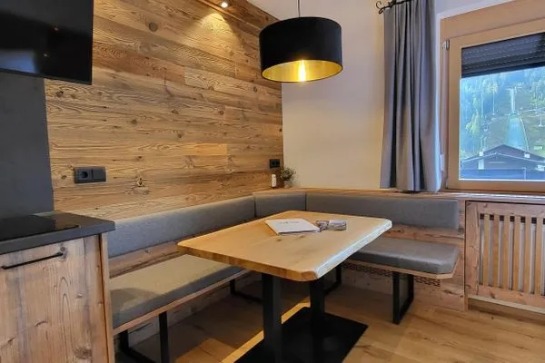 Wohnzimmer und Essbereich  Bergidyll 8 by Alpenidyll Apartments