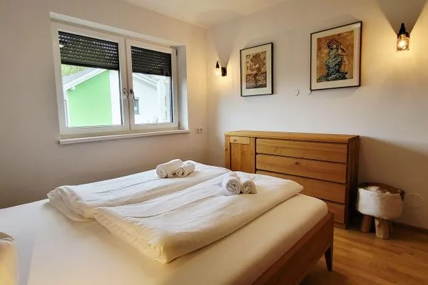 Schlafzimmer 1, Doppelbett  LandLiebe Aich by Alpenidyll Apartments