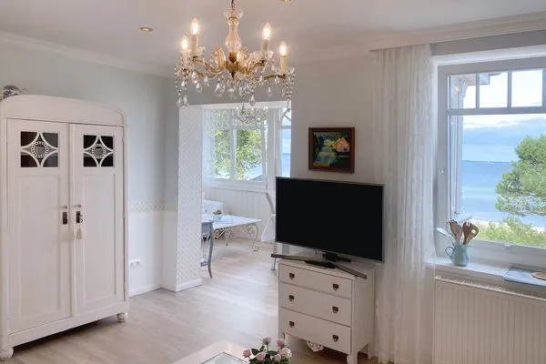 Wohnzimmer  Villa Hansa App. A2 - perfekter Blick über die Dünen auf die Lübecker Bucht