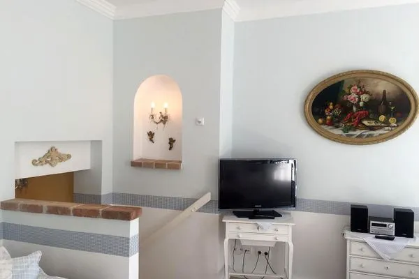   Villa Hansa App. C1 - mit Strandkorb und Palmen auf der Terrasse