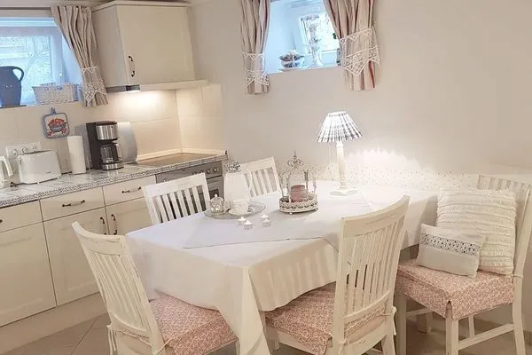 Küche / Küchenzeile  Villa Hansa App. C1 - mit Strandkorb und Palmen auf der Terrasse