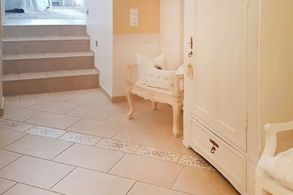   Villa Hansa App. C1 - mit Strandkorb und Palmen auf der Terrasse