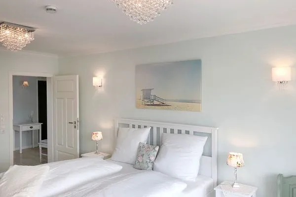 Schlafzimmer  Unser Sommerhaus - Ferienhaus mit Garten, Balkonen & Sonnenterrasse