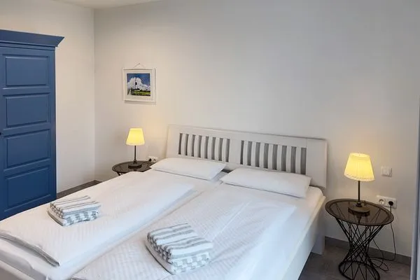 Schlafzimmer Haus *Weiße Düne* Ferienwohnung Weiße Düne 4