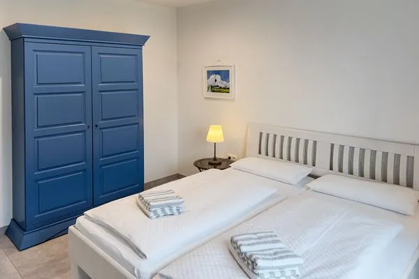 Schlafzimmer Haus *Weiße Düne* Ferienwohnung Weiße Düne 4