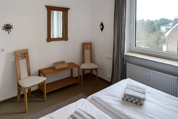Schlafzimmer Haus Leitfeuer Ferienwohnung „Blick 19"