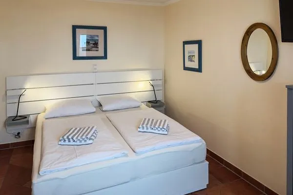 Schlafzimmer Haus Kap Hoorn Ferienwohnung Seeblick