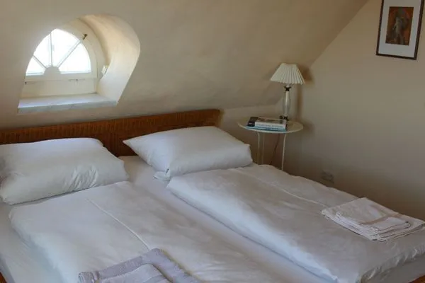 Schlafzimmer  Ferienwohnung Rundumblick - zentral in der Hafenstadt Sassnitz