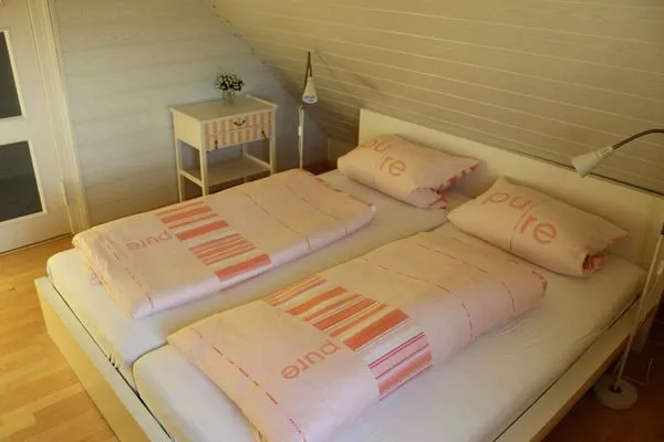 Schlafzimmer  Ferienwohnung Rundumblick - zentral in der Hafenstadt Sassnitz
