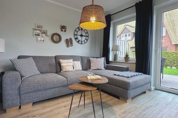 Ferienhaus Anlage Ostland17 Dünenlöper/ Nr. 17 a Dorf - Wohnzimmer