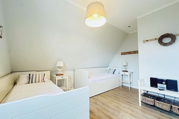 Ferienhaus Anlage Ostland17 Dünenlöper/ Nr. 17 a Dorf - Schlafzimmer