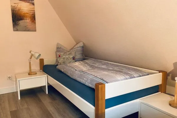 Schlafzimmer mit Einzelbetten Achtern Diek Achtern Diek 12b - Wohnung 5
