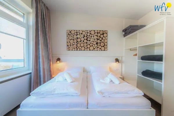 Schlafzimmer Haus Dünenblick Ferienwohnung 1