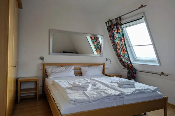 Schlafzimmer  Fewo "An de Waterkant" - Leuchtturmblick, Balkon