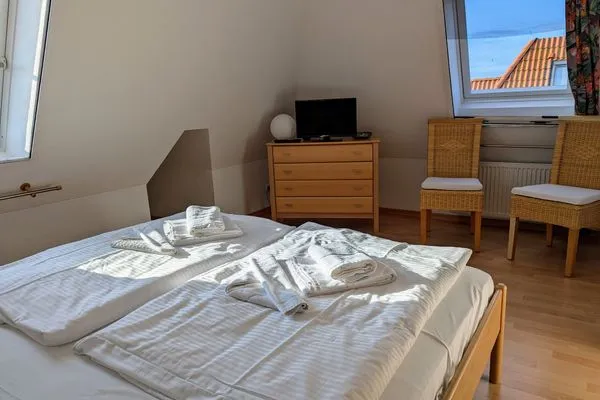 Schlafzimmer  Fewo "An de Waterkant" - Leuchtturmblick, Balkon