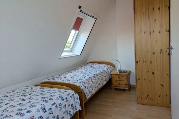 Schlafzimmer  Fewo "An de Waterkant" - Leuchtturmblick, Balkon