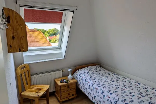 Schlafzimmer  Fewo "An de Waterkant" - Leuchtturmblick, Balkon