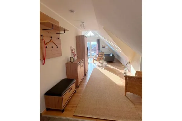 Flur mit Blick zum Wohnzimmer  Ferienwohnung Seepferdchen
