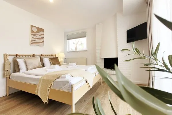 Modernes gemütliches Appartement für 2 in Neustadt in Holstein  Charmantes Appartement am Hafen mit gratis Bettwäsche-Paket und Terrasse