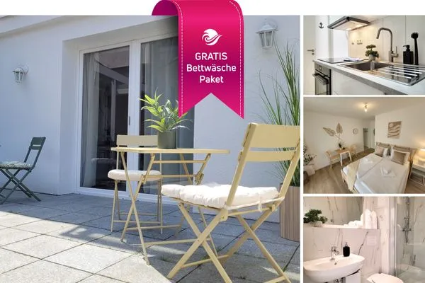 Modernes Hafenappartemen in Neustadt in Holstein für 2 Personen  Charmantes Appartement am Hafen mit gratis Bettwäsche-Paket und Terrasse