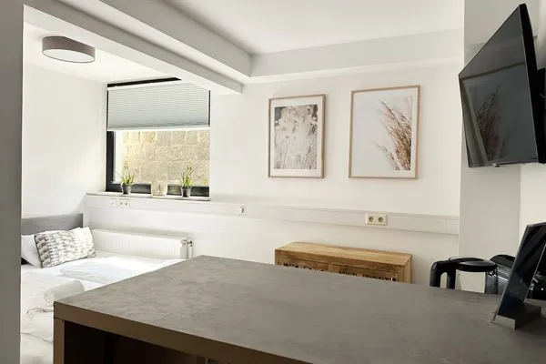 Charmantes Appartement in Haffkrug für ein Wochenende  Strandnahe Mini Ferienwohnung im Souterrain mit gratis Wäschepaket