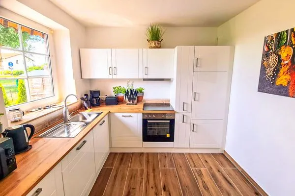 Küche / Küchenzeile  Ferienhaus Haffliebe mit Sauna und Kamin