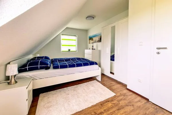 Schlafzimmer  Ferienhaus Haffliebe mit Sauna und Kamin