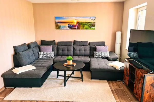 Wohnzimmer  Ferienhaus Haffliebe mit Sauna und Kamin