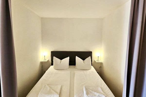  Ferienappartement Panoramablick Ferienwohnungen in Hopfen am See - Schlafzimmer