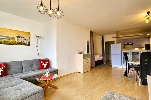  Ferienappartement Panoramablick Ferienwohnungen in Hopfen am See - Wohnzimmer