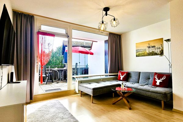  Ferienappartement Panoramablick Ferienwohnungen in Hopfen am See - Wohnzimmer