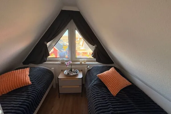 Schlafzimmer mit Einzelbetten  Ferienwohnung Seepferdchen