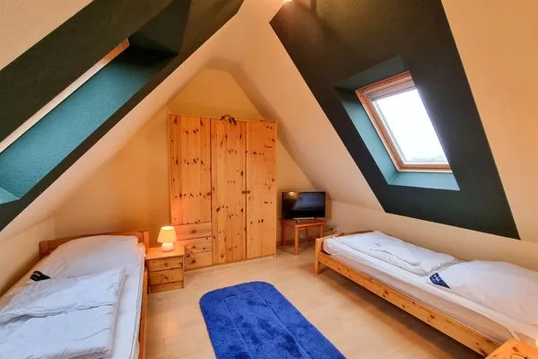 Schlafzimmer  Ferienwohnung Johanna - am Wieker Bodden gelegen