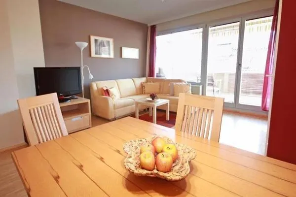 Essbereich mit Fernseher  Apart 13 by Alpenidyll Apartments