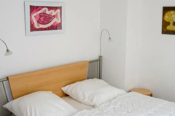 Schlafzimmer Haus Düne 5 Wohnung 1