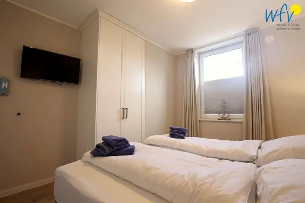 Schlafzimmer Villa Petersen Ferienwohnung Strandliebe